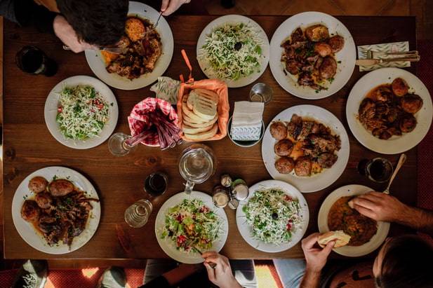 Many Food bowls on a table