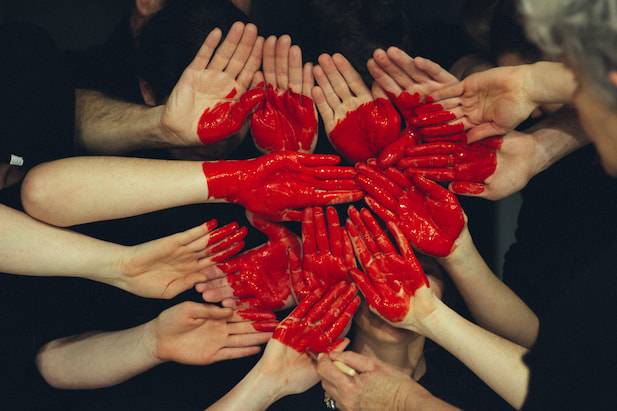 hands formed together that signifies love through charity