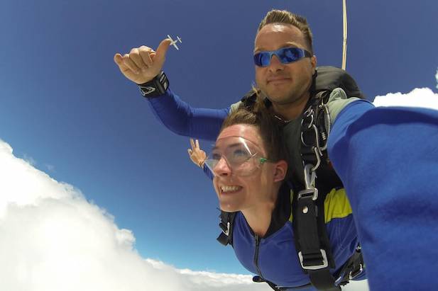 skydiving through the clouds